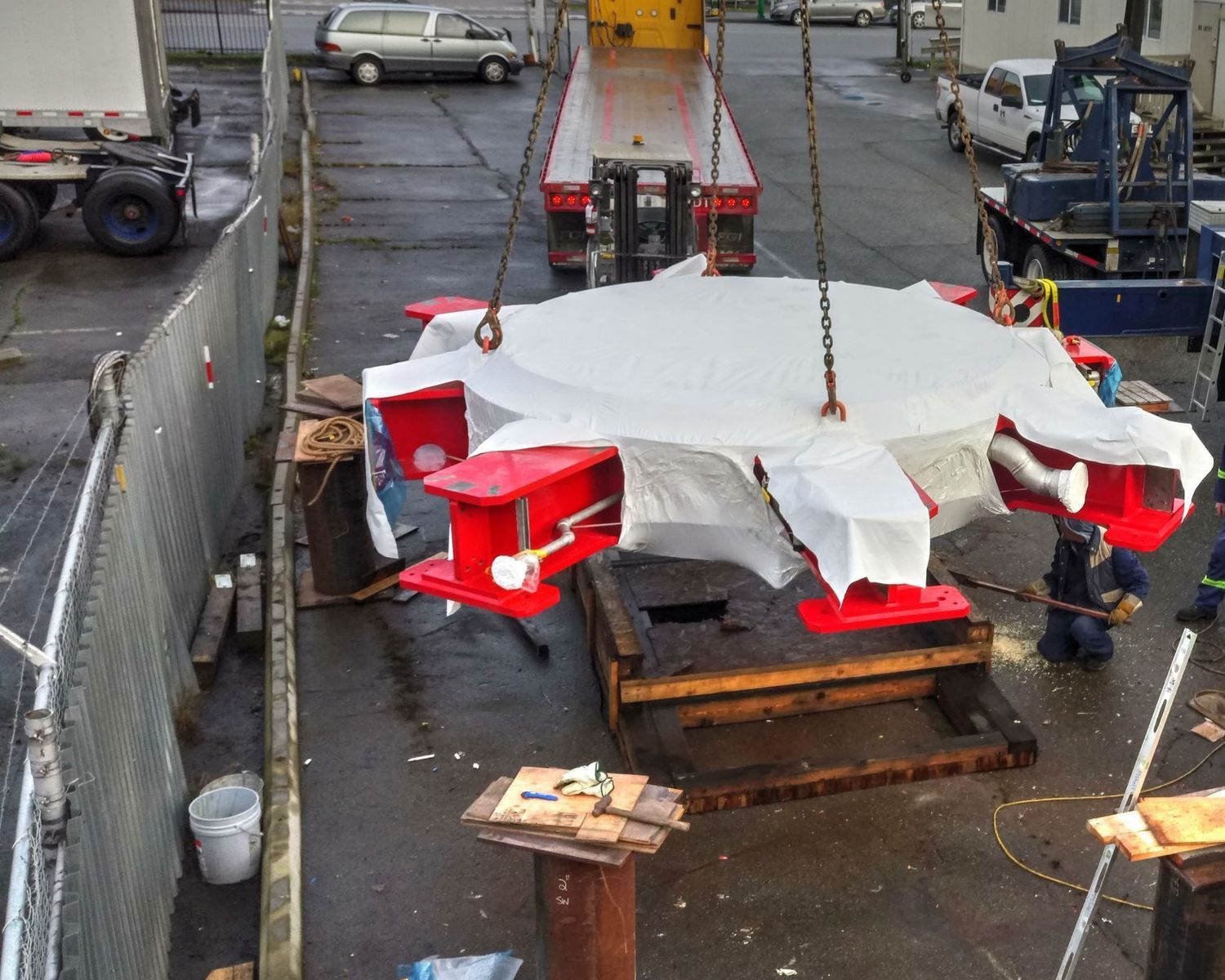 Generator thrust bracket lifted by crane