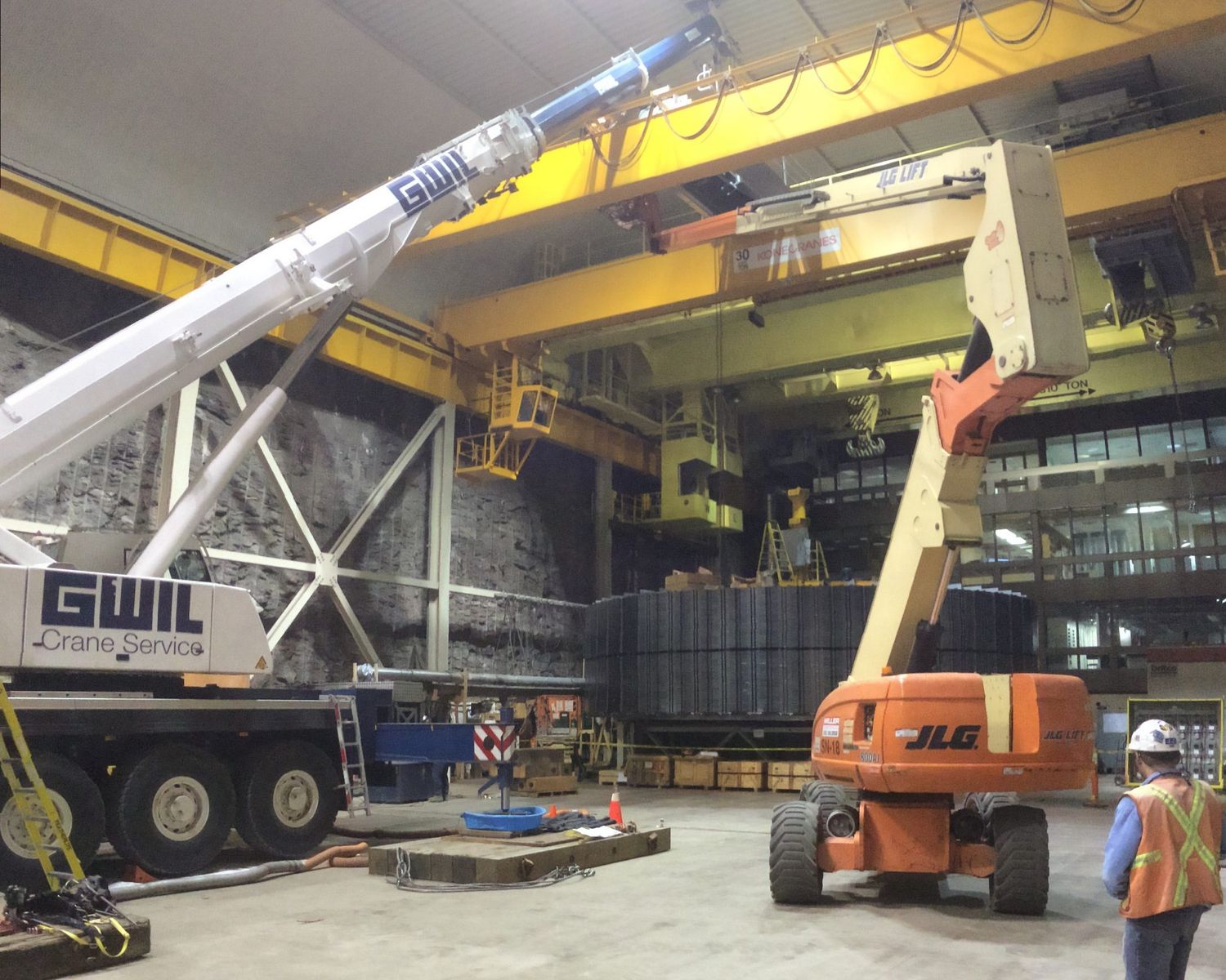 Mobile crane and boom lift inside the powerhouse