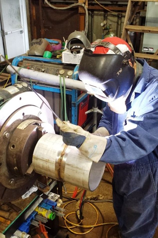 A Mitchell welder fabricating a pipe spool